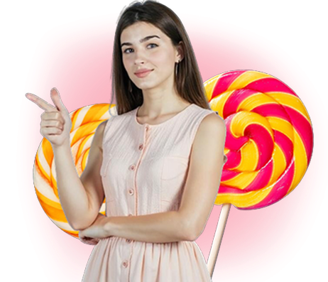 A young woman in a light pink dress confidently pointing sideways with two large colorful swirl lollipops behind her, all on a transparent background, promoting the playful and inviting atmosphere of KuyaPlay login